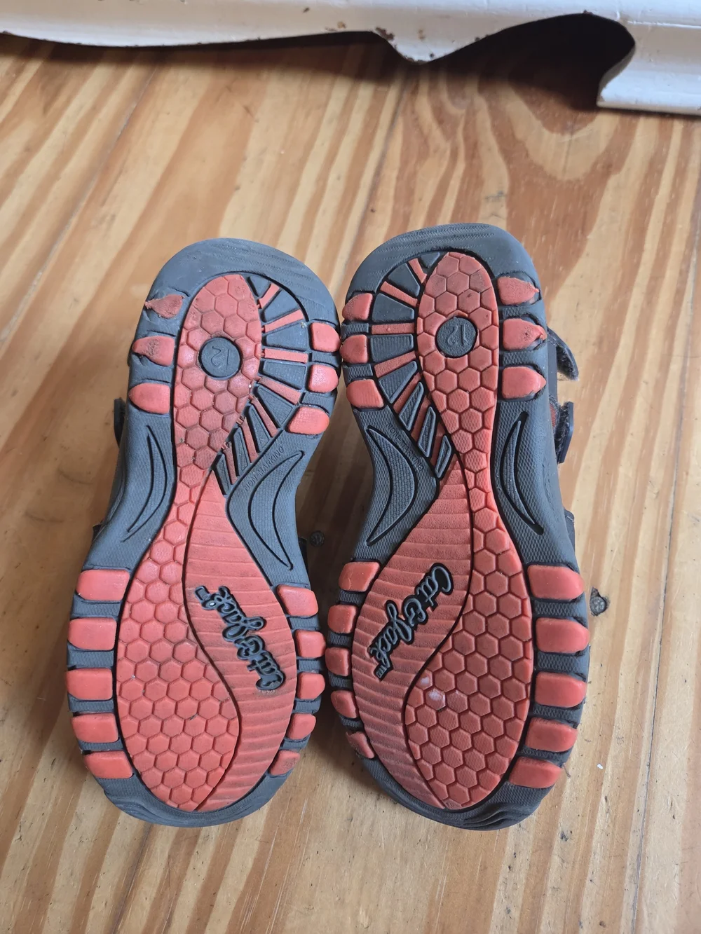 Kids Closed-Toe Sandals in Black with Orange Accents